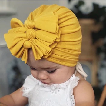 Ir 2021. Mezgls Loku Bērnu Galvassegu Toddler Headwraps Baby Ziedu Turban Cepures Babes Caps Elastīgās Matu Aksesuāri Bērnam 0-4Y